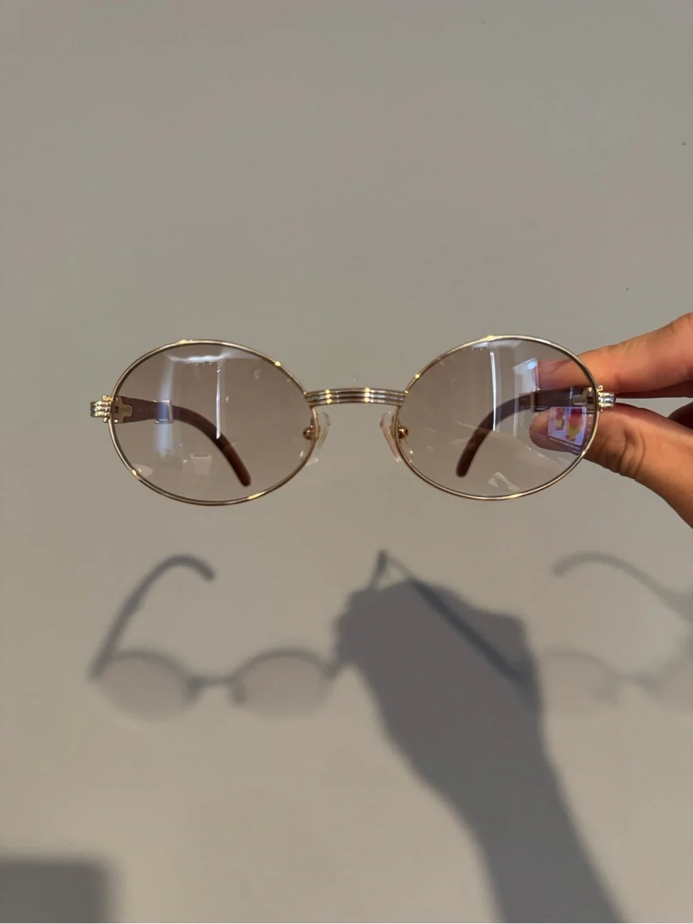 Cartier Gold Round Metal Frame Sunglasses with Brown Temples